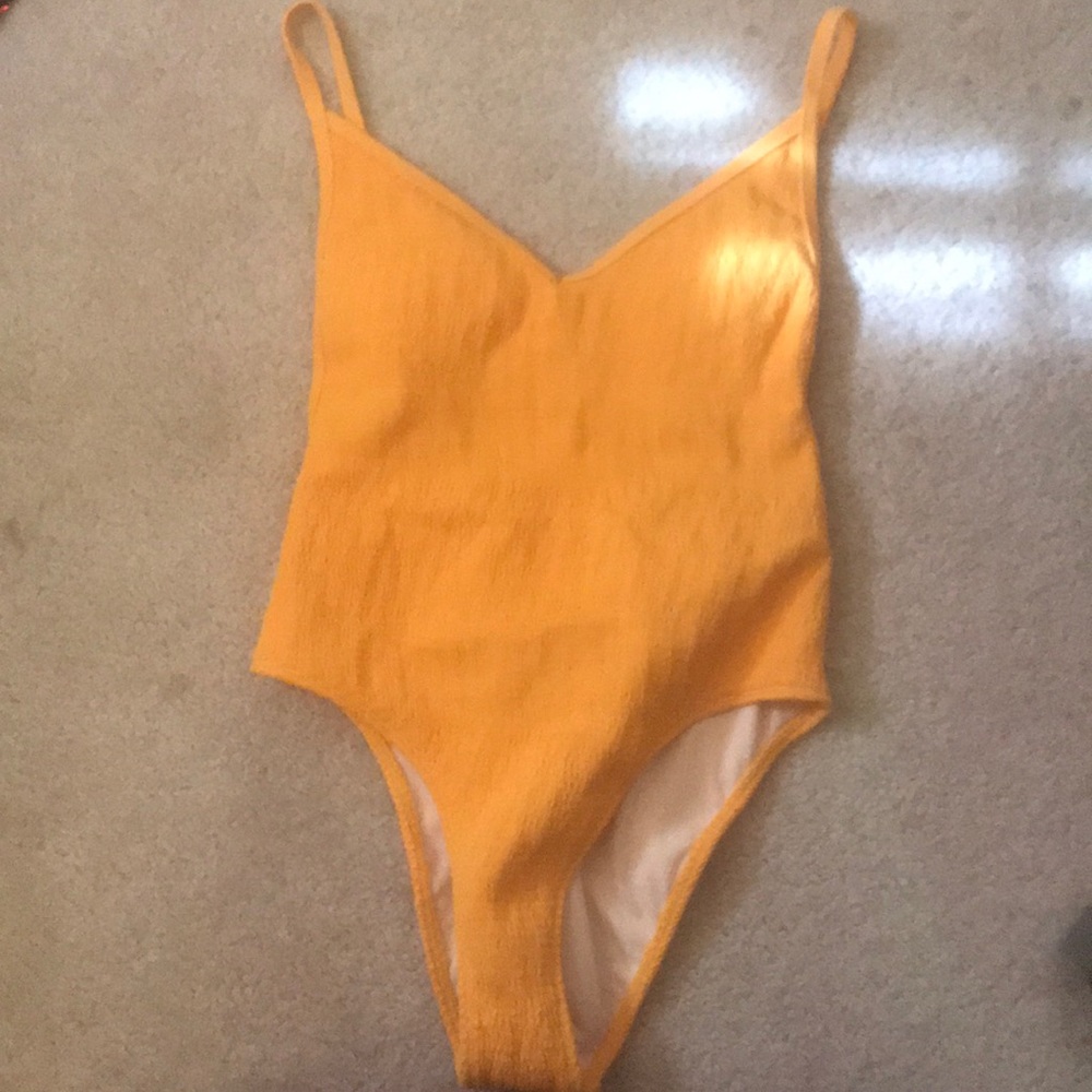 Kendall and Kylie yellow bathing suit